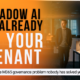 IT professional standing in a dimly lit office — headline reads "Shadow AI is already in your tenant: the M365 governance problem nobody has solved yet"